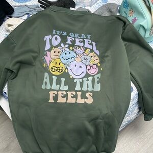 It’s okay to feel all the feels crewneck sweatshirt